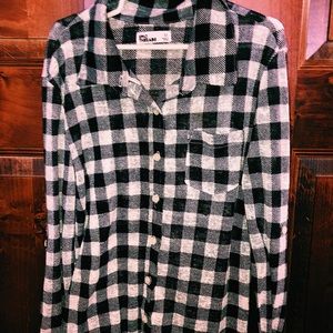 Black and white plaid button down. CHILD.